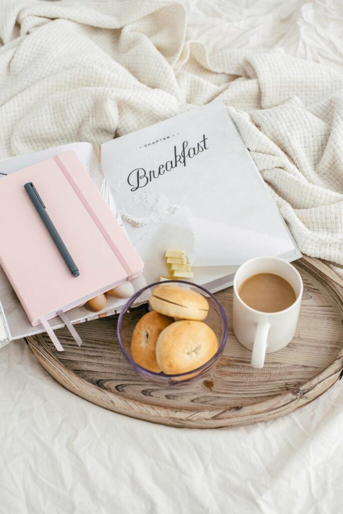 How I Became An Organized Blogger: 10 Productivity Boosts 3 Breakfast on a platter with a notebook that says breakfast; how become an organized blogger.