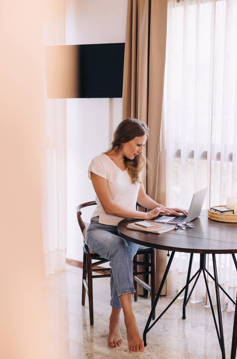 Blog Branding Toolkit 4 Woman typing on a laptop.