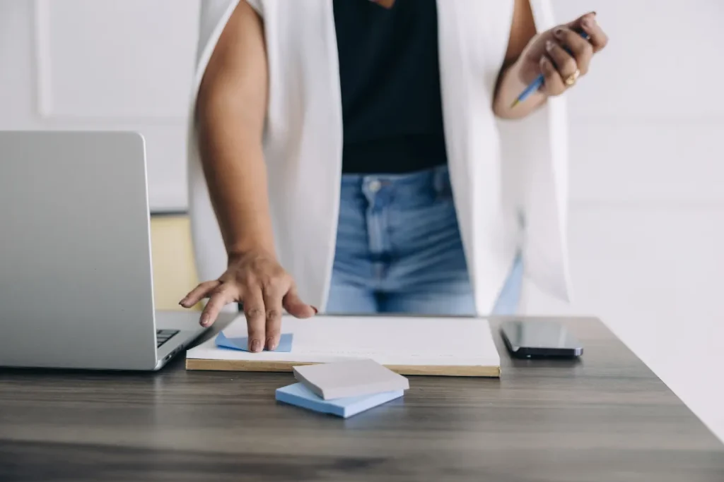 15 Profitable Blog Niches For 2026 & How To Choose The Right One For You 1 Woman using a laptop - most profitable blog niches.