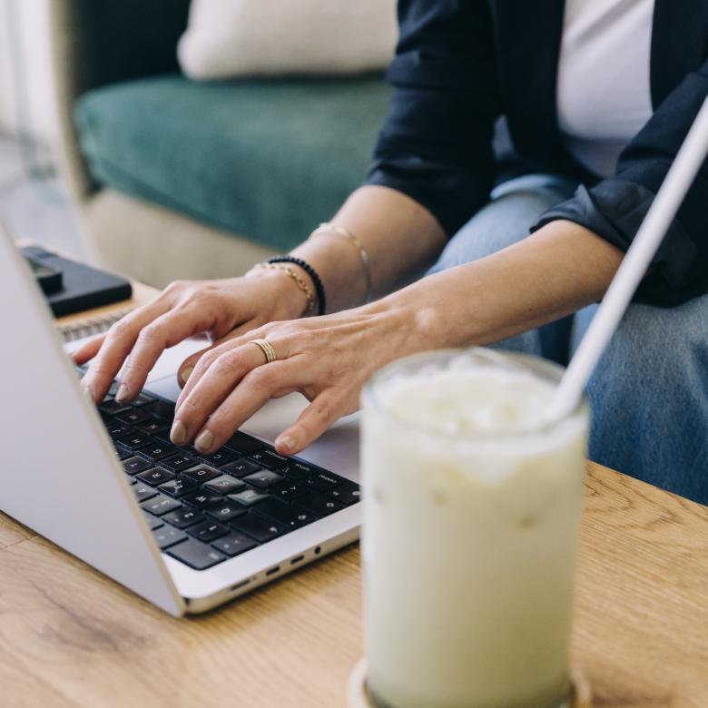 Blog Menu Design Tips For A Clear, Conversion-Friendly Website 3 Blog Menu Design Woman Typing
