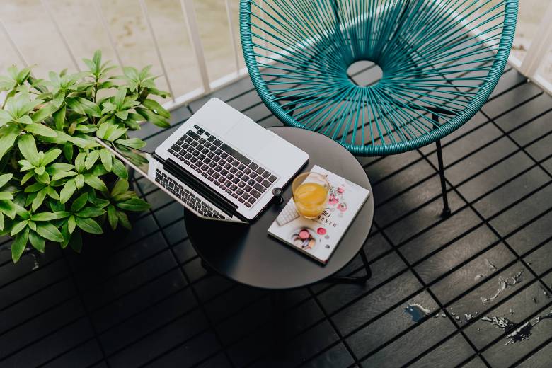 WordPress Setup and Maintenance Guide: What to Do After Installing WordPress 4 WordPress Setup and Maintenance For Bloggers laptop on a table
